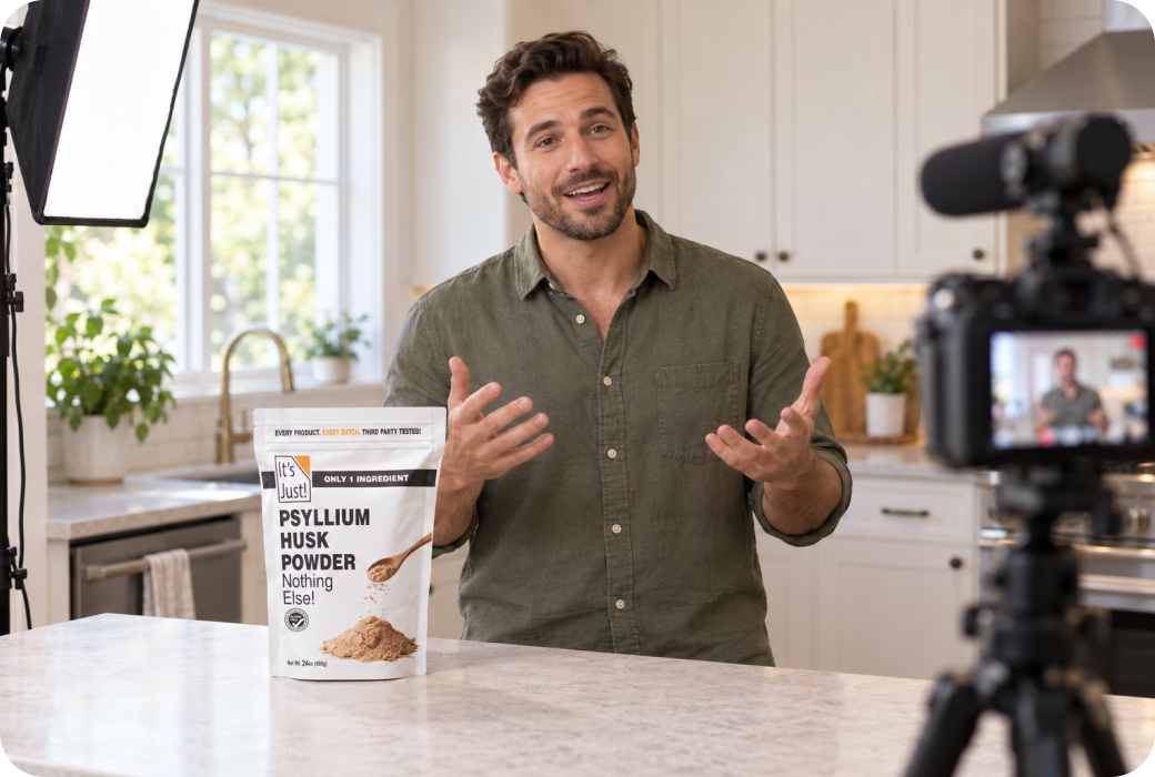 A male creator speaking to camera with filming lights and Psyllium on the counter
